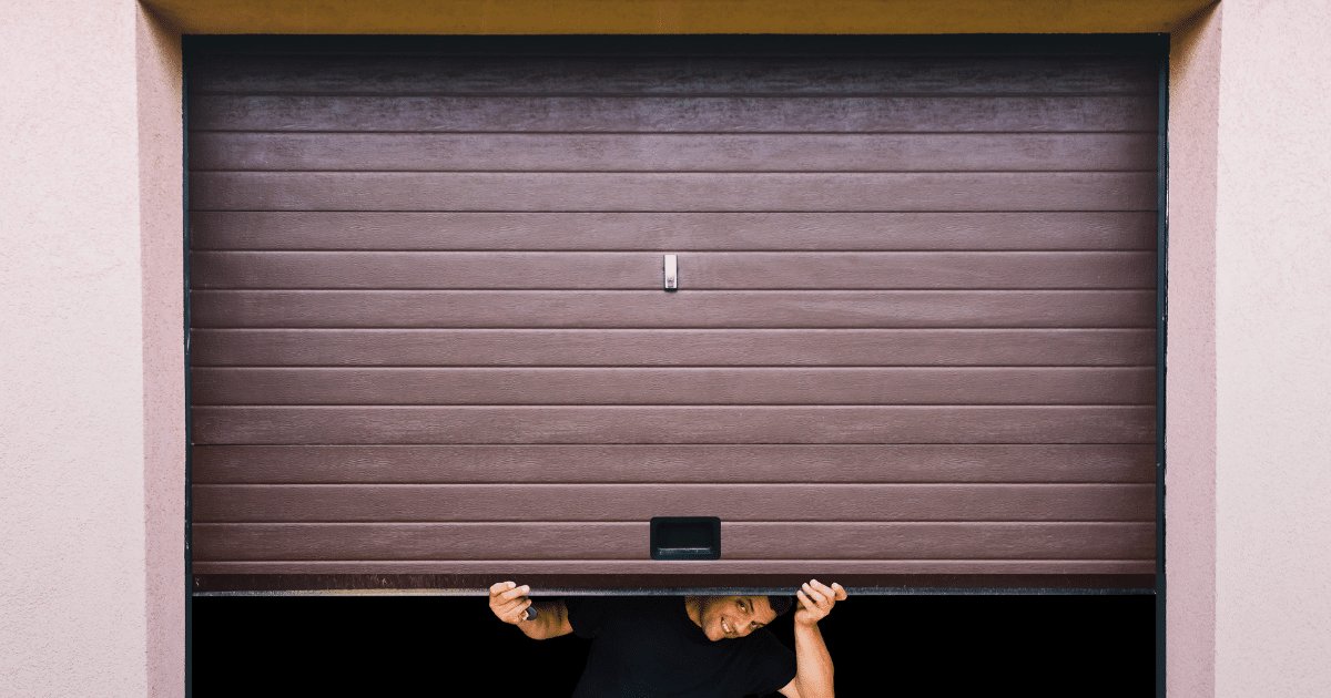 Emergency garage door repair in Evansville — technician servicing a stuck garage door.