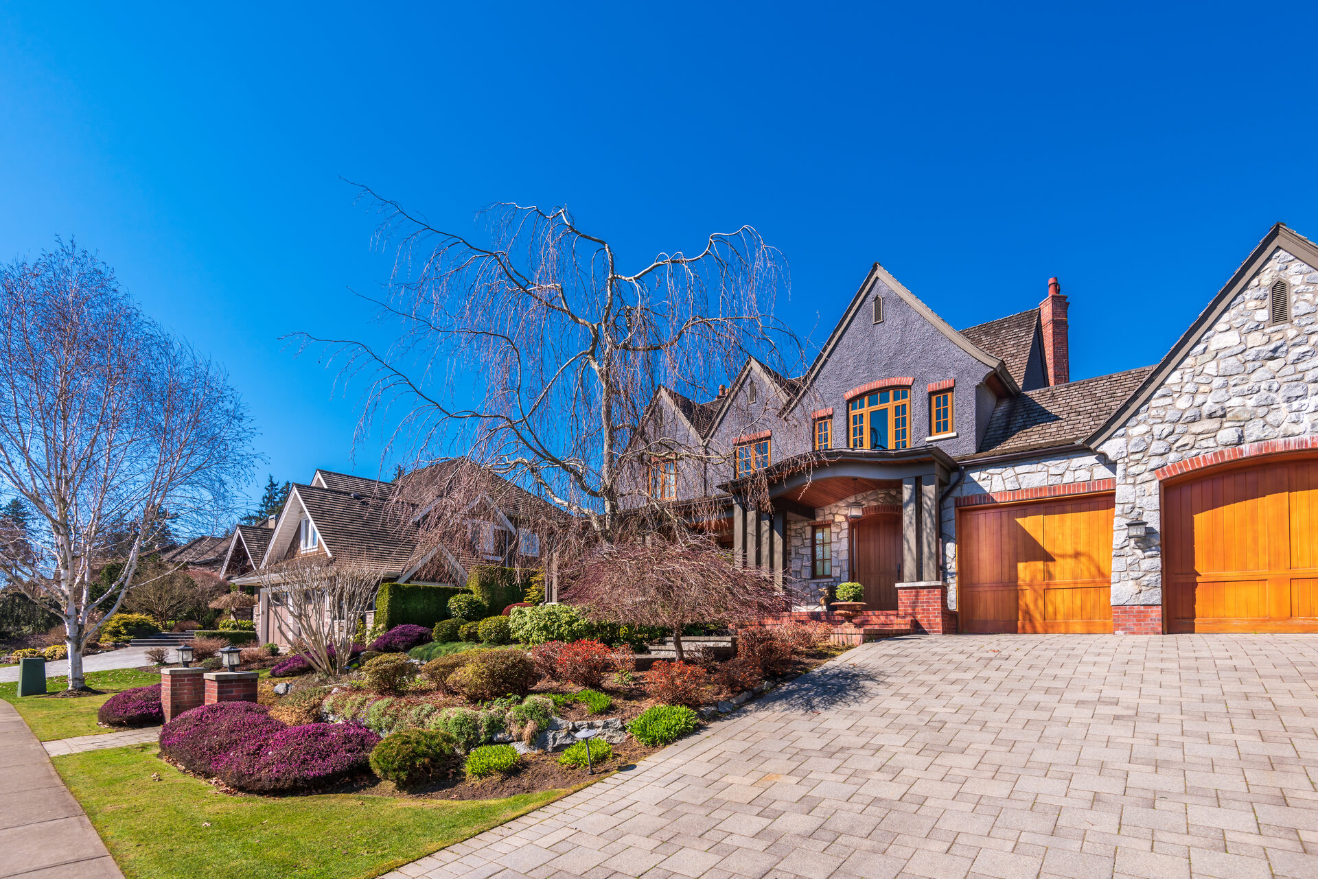 Suburban neighborhood in spring — the kind of homes River City serves across Indiana, Kentucky & Illinois