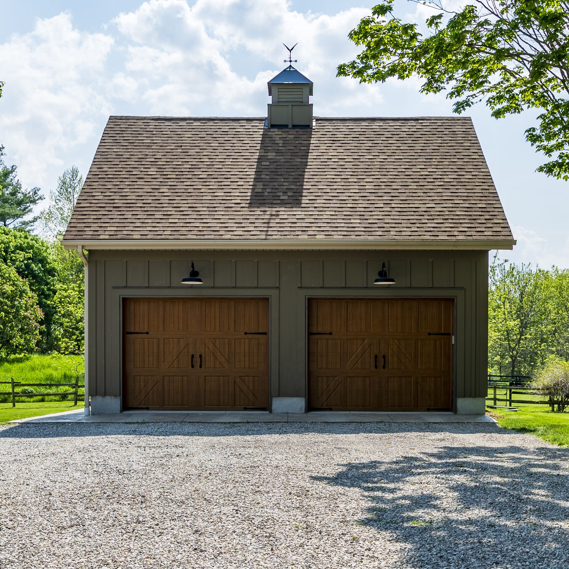 Two-car barn-style garage with insulated wood-look doors
